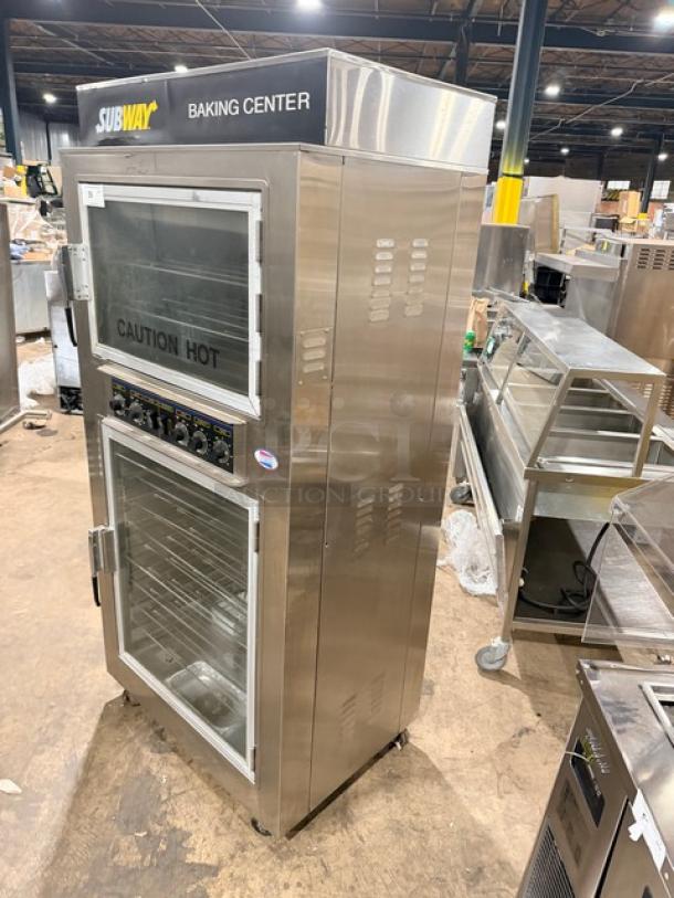 Nu-Vu SUB123 stainless steel double deck oven/proofer combo with wired racks. Electric, 208V 3 Phase, on casters.