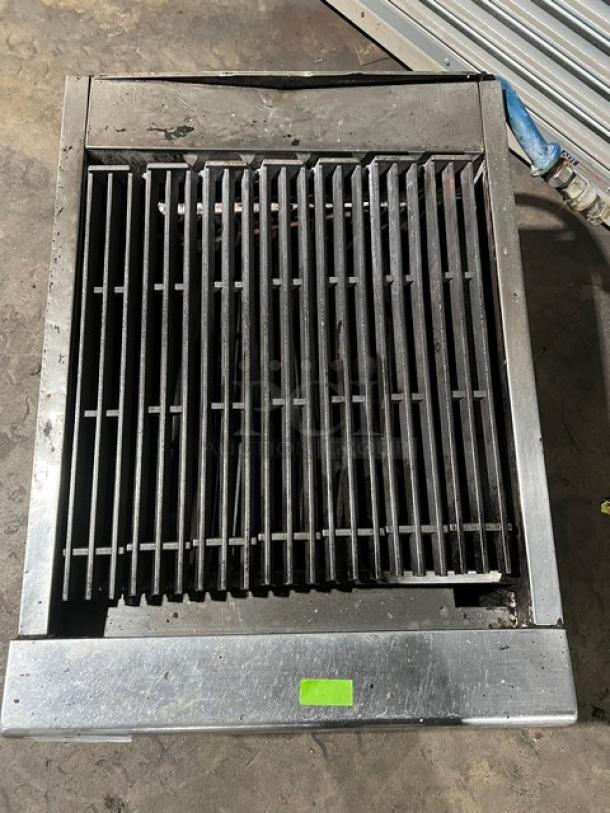 Garland stainless steel gas countertop char broiler, legs included. Features adjustable grates, visible wear.