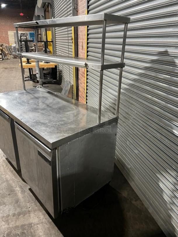 Continental SW60 stainless steel 2-door worktop refrigerator with double overhead shelf, ticket holder, and poly-coated rack.