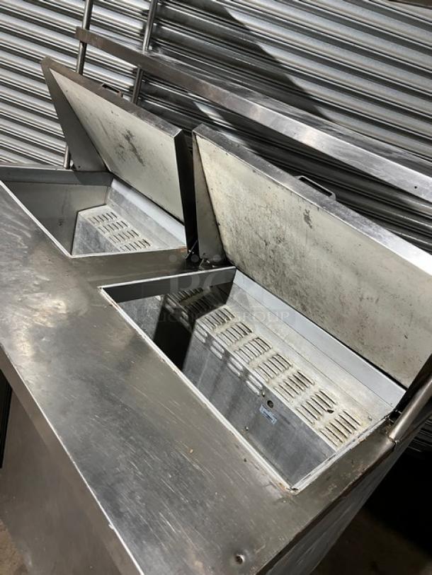 Continental SW60-24M stainless steel 2-door refrigerated prep table, with overhead shelf and poly coated rack. Model: SW6024M.