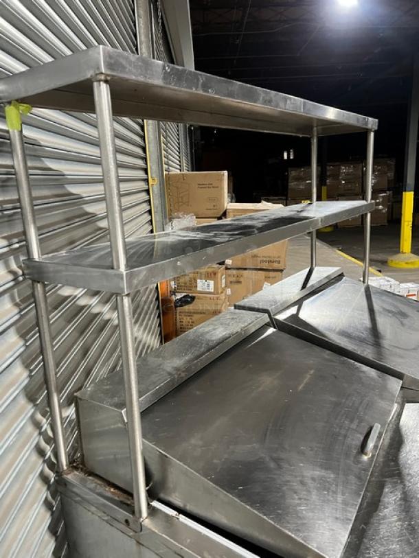 Continental stainless steel 2-door refrigerated prep table, model SW60-24M. Features double overhead shelf, poly-coated rack.