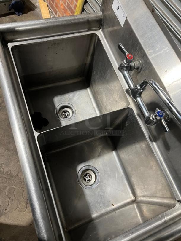 L&J stainless steel 2-compartment prep sink with swing spout swivel faucet. Mounted on sturdy legs. Used condition.