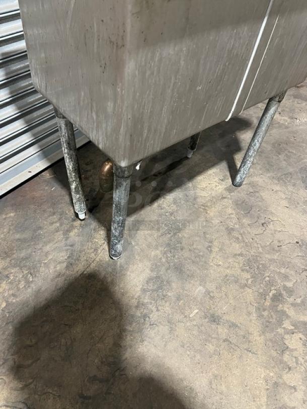 L&J Commercial Stainless Steel 2-compartment prep sink with swing spout swivel faucet on sturdy legs, visible wear.