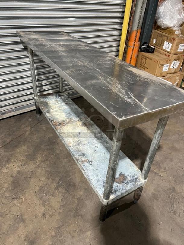 Regency 600T1860G stainless steel worktop table, 18"x60", single undershelf, used condition, sturdy legs, commercial grade.