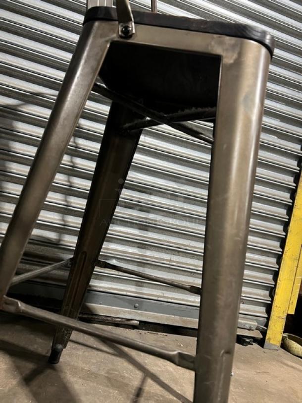 Commercial stackable bar-height chair with metal frame. Durable construction, suitable for various settings. Multiples available.