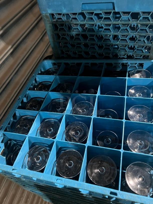 Carlisle blue 25-compartment cup rack with extenders, filled with assorted glassware; used condition.