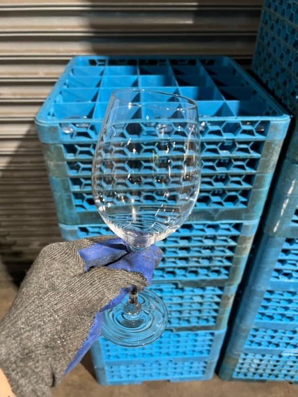 Carlisle blue 25-compartment cup rack with extenders and assorted glasses. Light wear. Ideal for commercial use.