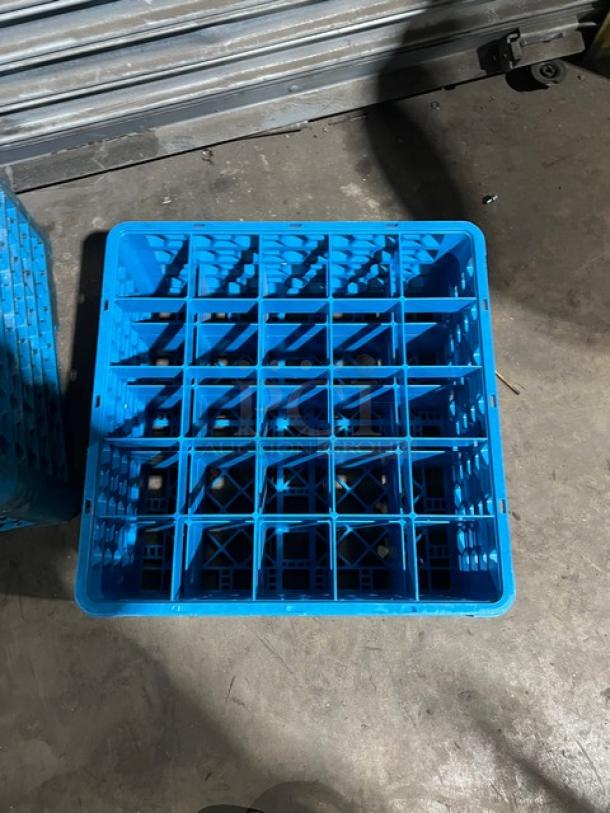 Carlisle blue 25-compartment cup rack with extenders, shown on concrete floor. Appears in good condition.
