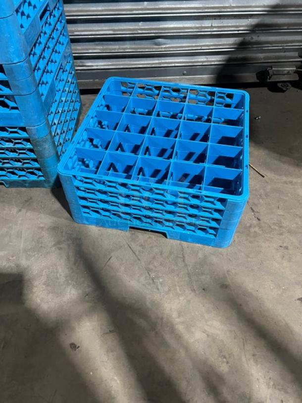 Carlisle blue 25-compartment cup rack with extenders, used condition. Ideal for commercial glassware storage.