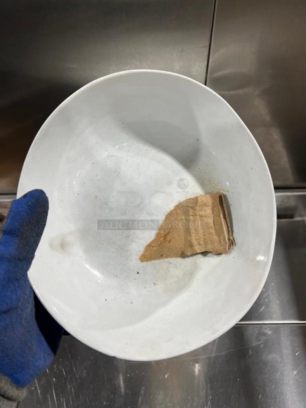 Anfora commercial white round bowl, medium-sized, with minor wear and a small piece of cardboard inside.