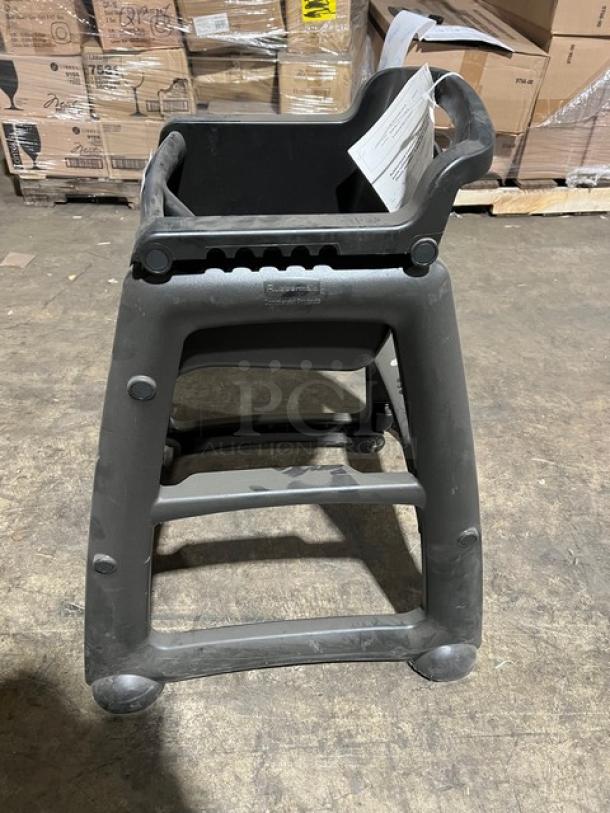 Rubbermaid Commercial black restaurant highchair, model FG780608BLA, on casters, durable condition.