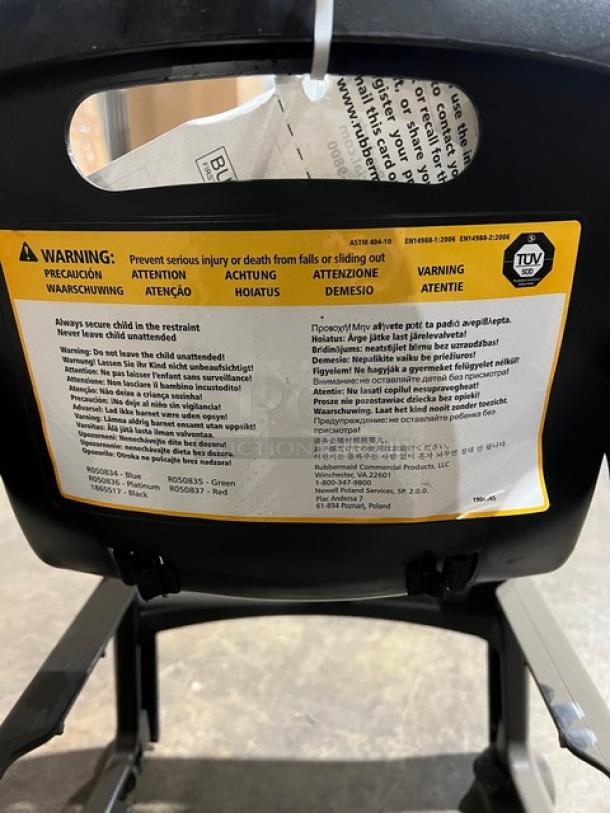 Rubbermaid Commercial Black Restaurant Highchair, Model FG780608BLA, on casters, with visible safety and use warning label.