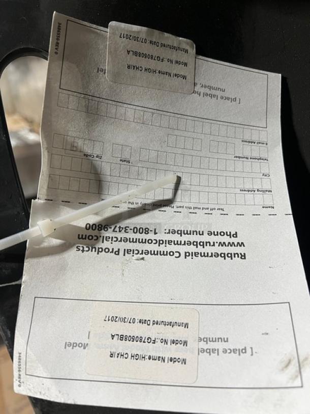 Rubbermaid Commercial Black Highchair, Model FG780608BLA, on casters. Visible label shows model and manufacturing details.