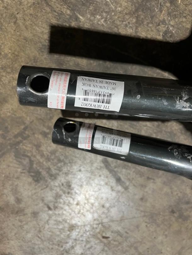 Commercial Black Non-Stick Frying Pan with labels on handles, labeled "16'' Taiwan Wok, Made in Taiwan," model THH-TYWK002.