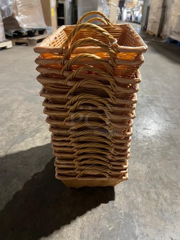 Stack of 17 woven display baskets, rectangular shape, natural wicker material, excellent condition, with handles for easy carrying.