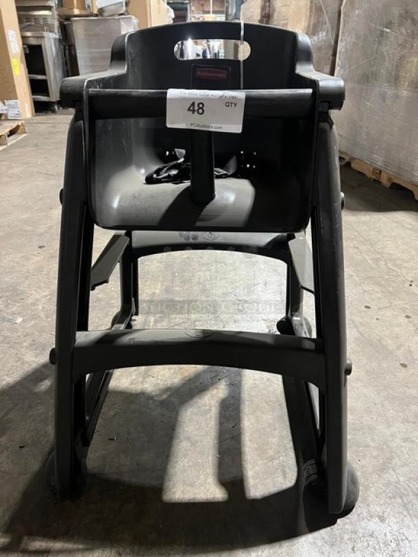 Rubbermaid Commercial highchair in black with casters. Good condition. Visible label with item number 48.