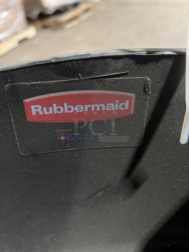Rubbermaid Commercial black restaurant highchair on casters, features durable plastic, shows Rubbermaid logo, good condition.
