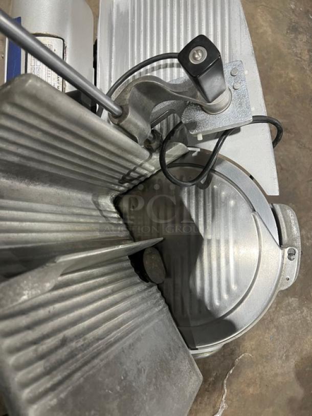 Hobart 1712 commercial deli meat slicer, electric, countertop, heavy-duty, 115V, used condition, visible blade and controls.