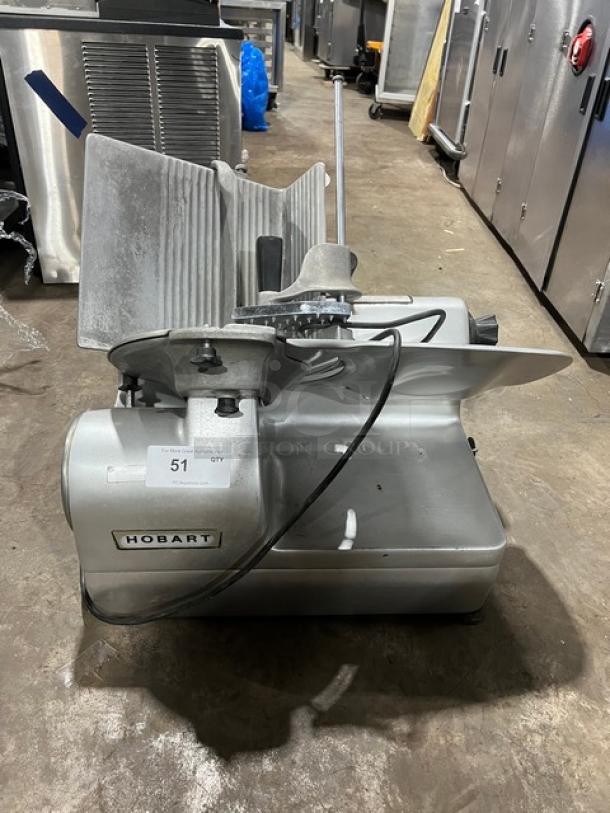 Hobart 1712 deli meat slicer, electric-powered, heavy-duty metal, countertop model, good condition, SN: 1929005, 115V 1 Phase.