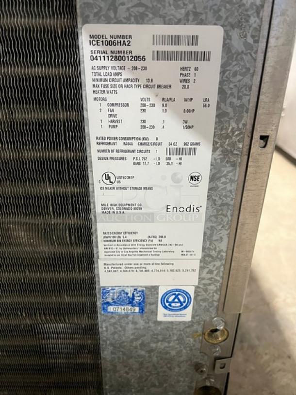 Ice-O-Matic Elevation Series commercial ice machine head, model ICE1006HA2. Includes detailed label showing specifications.