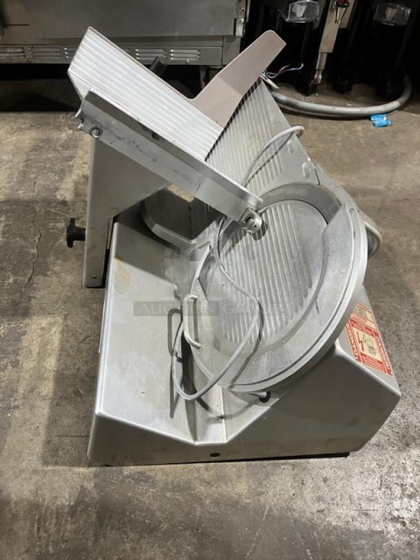 Bizerba stainless steel electric deli meat slicer, countertop model, SN: 10401317, 120V, 1 phase, good condition.