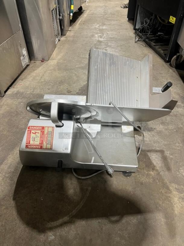 Bizerba stainless steel electric deli meat slicer, model SN: 10401317, 120V, 1 phase, commercial grade, countertop size, with safety label.