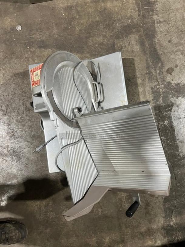 Bizerba commercial stainless steel electric deli meat slicer, SN: 10401317, 120V, 1 phase, countertop model, used condition.