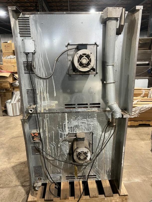 Imperial Commercial Stainless Steel Natural Gas Double-Stack Convection Oven. Includes wired oven rack, casters visible.