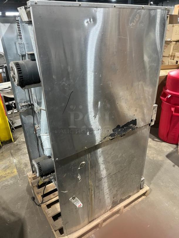 Imperial stainless steel natural gas double-stacked convection oven, used condition, on casters, includes wired oven rack.