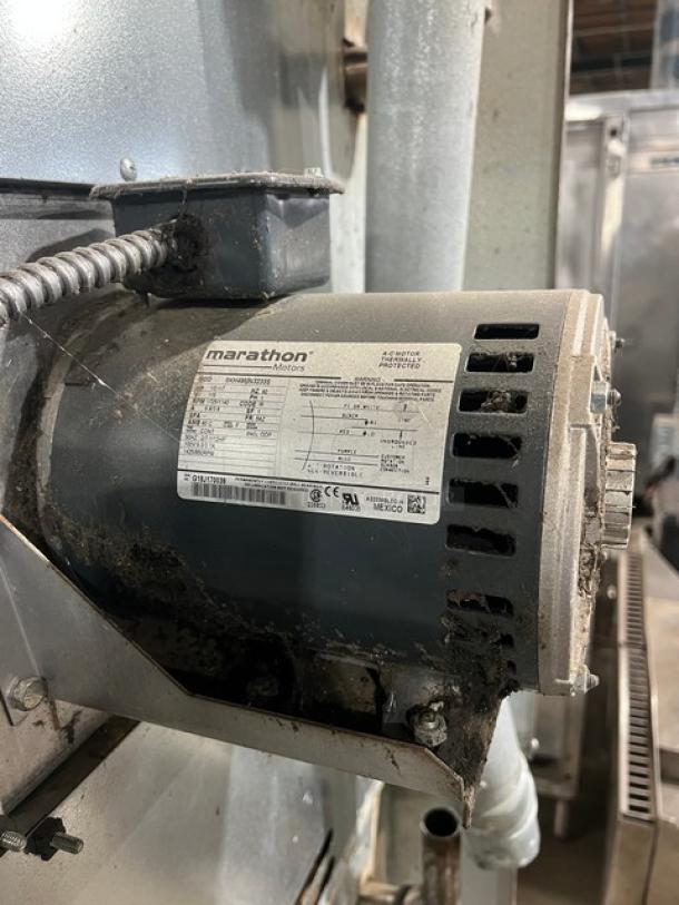 Imperial double-stacked convection oven, stainless steel, natural gas, includes wired rack, on casters. Label shows motor specs.