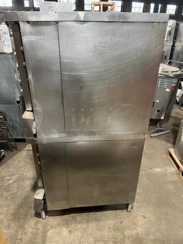 Blodgett double-stacked stainless steel convection oven, natural gas powered, on legs with wired oven rack, used condition.