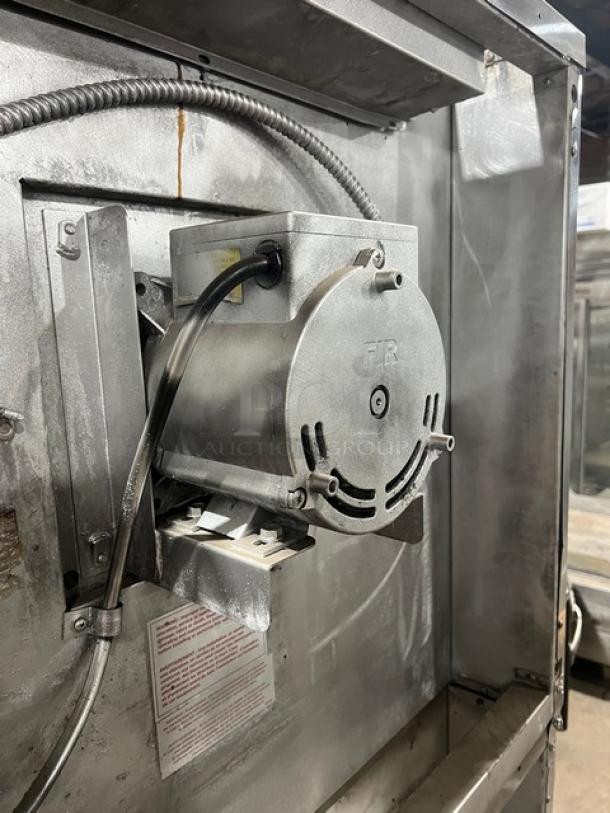 Blodgett commercial stainless steel natural gas convection oven motor. Wired, mounted on oven. Visible power cord and label.