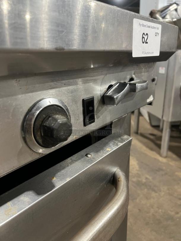 Southbend stainless steel 6-burner range/oven with backsplash, overhead salamander shelf, and wired oven rack. On casters.