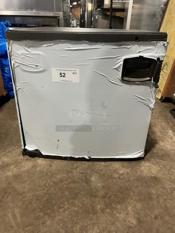 Commercial stainless steel electric ice making machine head, slightly worn. Label shows "52 QTY."