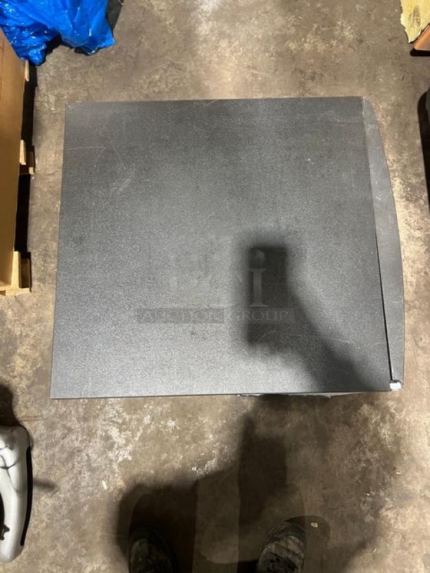 Commercial stainless steel electric ice making machine head, solid condition, features durable construction.