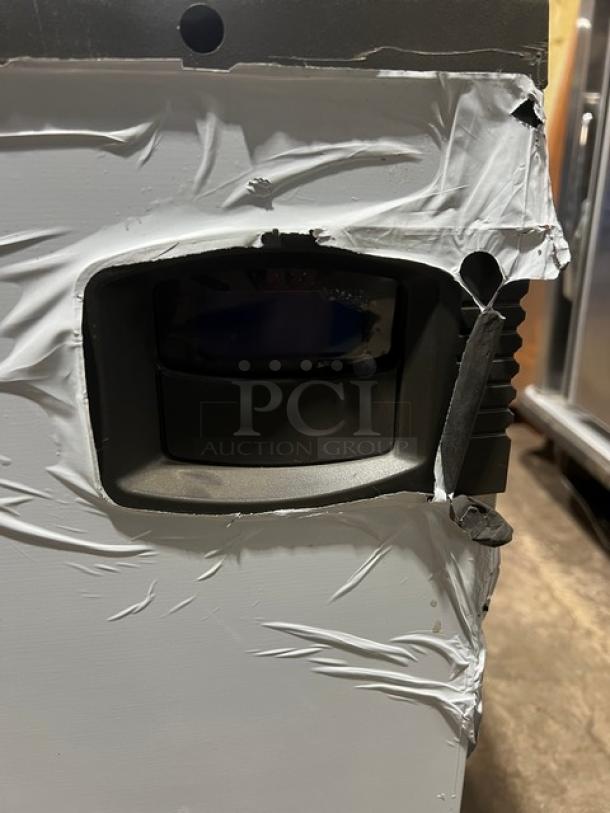 Commercial stainless steel electric ice maker head, visible control panel, wrapped edges, new condition.