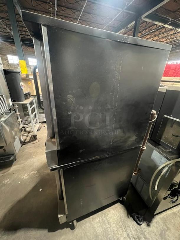 Southbend SilverStar Series stainless steel double-stacked gas convection oven, used condition, on casters with wired oven rack.