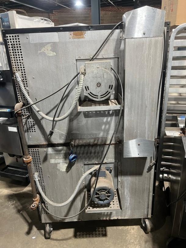 Southbend SilverStar stainless steel gas double convection oven, wired racks, on casters, auction item, commercial use.