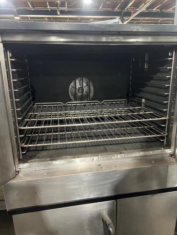 Southbend SilverStar Series stainless steel gas convection oven, double stacked, with wired rack, on casters, used condition.