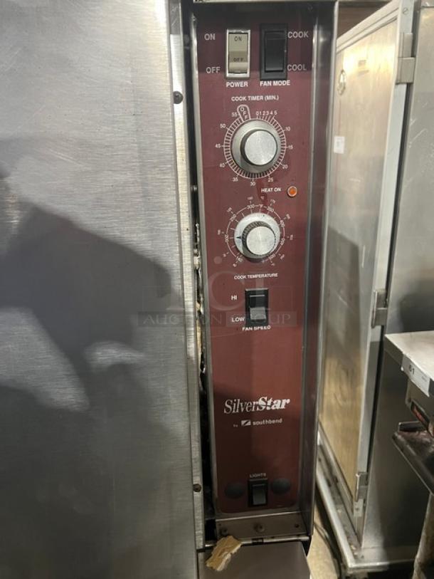 Southbend SilverStar Series commercial double stacked convection oven, stainless steel, gas powered, with wired rack, on casters, control panel visible.