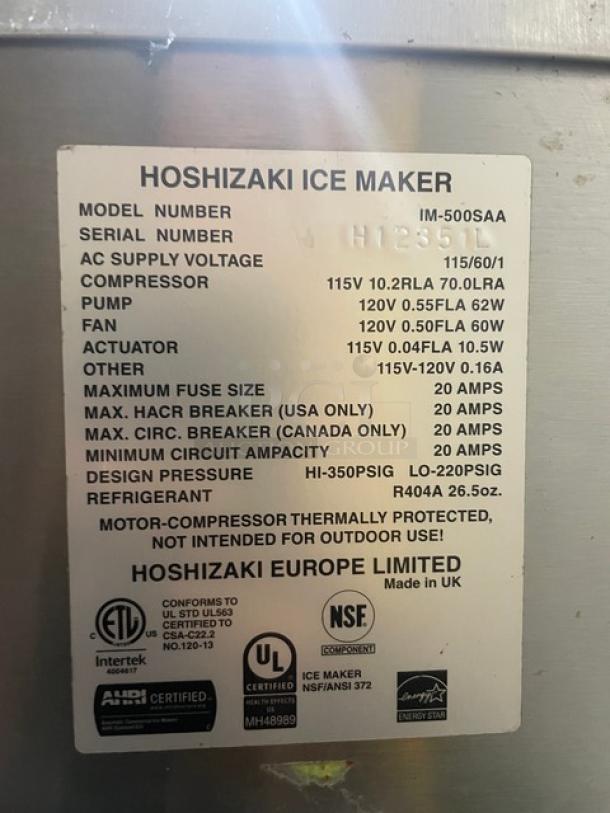 Hoshizaki IM500SAA ice maker label, detailing 115V power, compressor specs, refrigerant type R404A, and certification marks.
