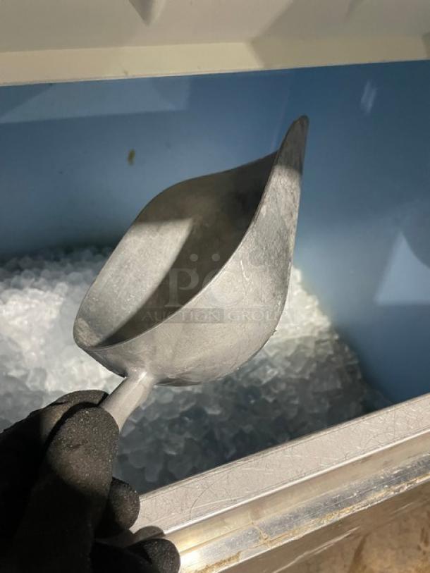 Hoshizaki IM-500SAA ice maker with bin, stainless steel, air-cooled, electric, includes ice scoop, shown with ice inside.