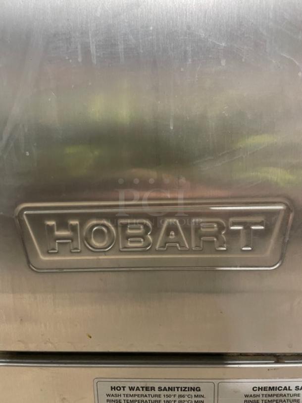 Hobart LXEH Series stainless steel dishwasher, embossed brand logo. High-temp, electric, undercounter, SN: 23-1149-570.