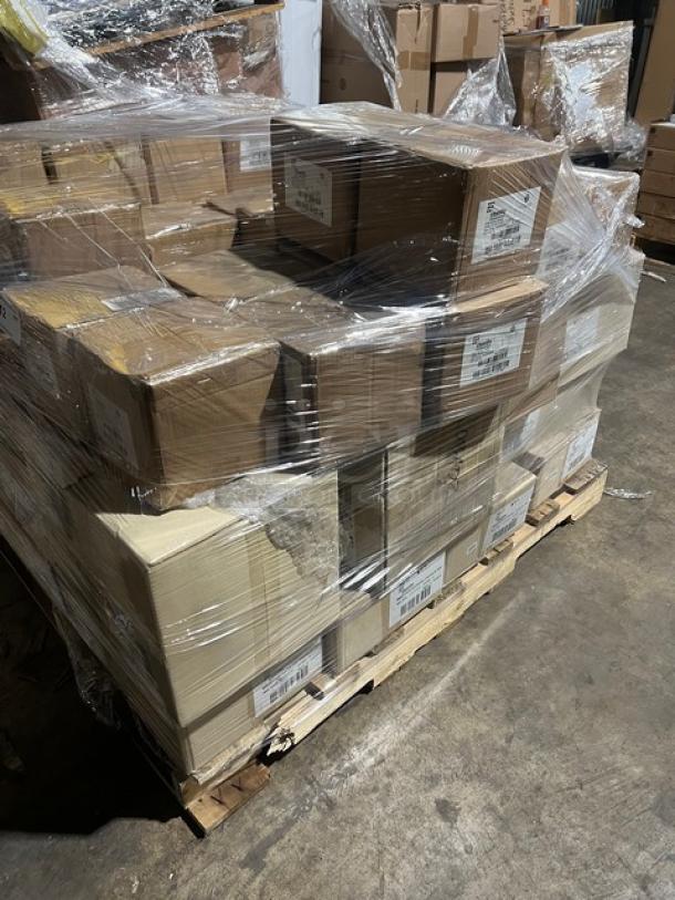 Mixed pallet of brand new Steelite International plates in boxes, featuring Tahara, Folio, Avalon, and Potter's Shell series, wrapped for shipping.