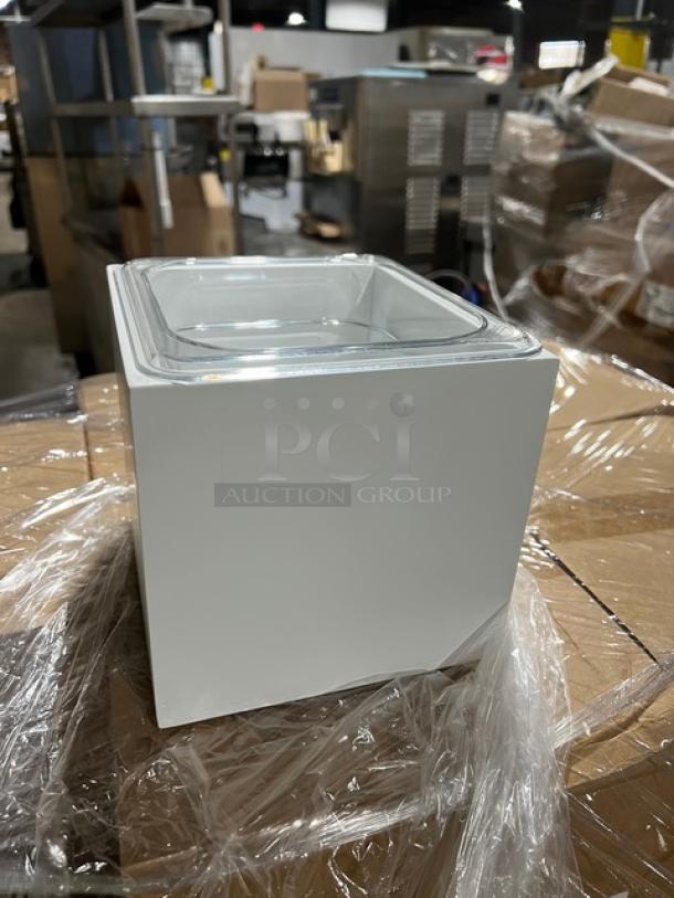 Brand new Cal-Mil 1600Custom white square ice merchandiser, clear polycarbonate pan, excellent condition, on pallet.