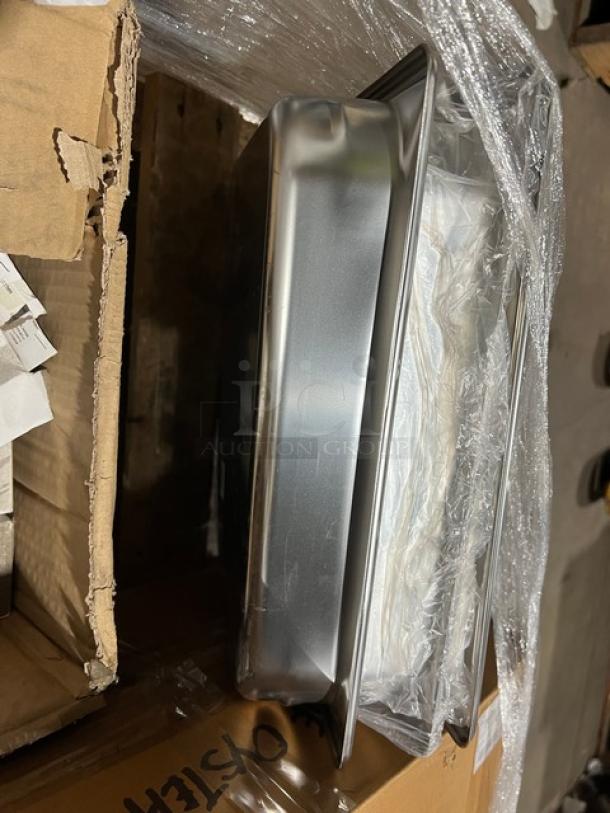 Mixed pallet with assorted commercial kitchen items, including Vollrath Super Pan V Series anti-jam pan, in brand-new condition.