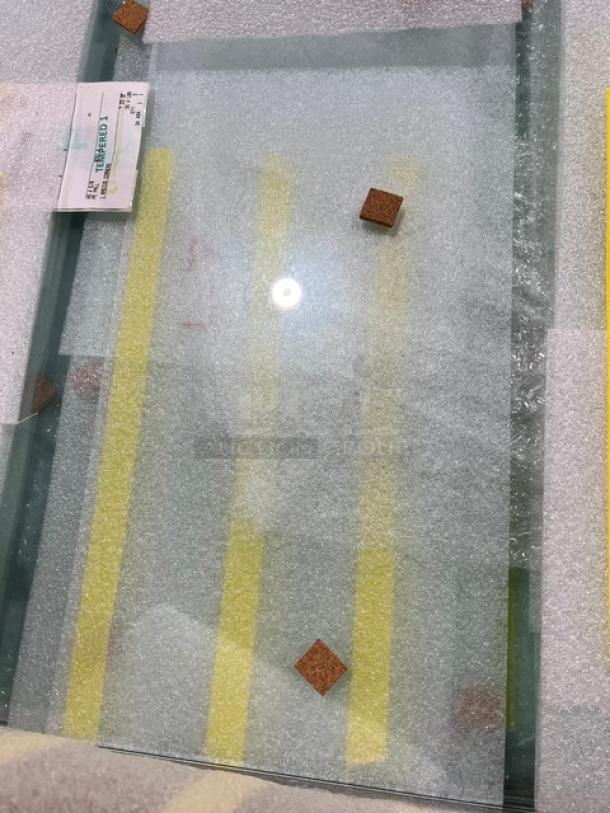 Brand new BSI ZGuard Series commercial 27" tempered glass food shield/sneeze guard, model ZG9500-4, in protective packaging.