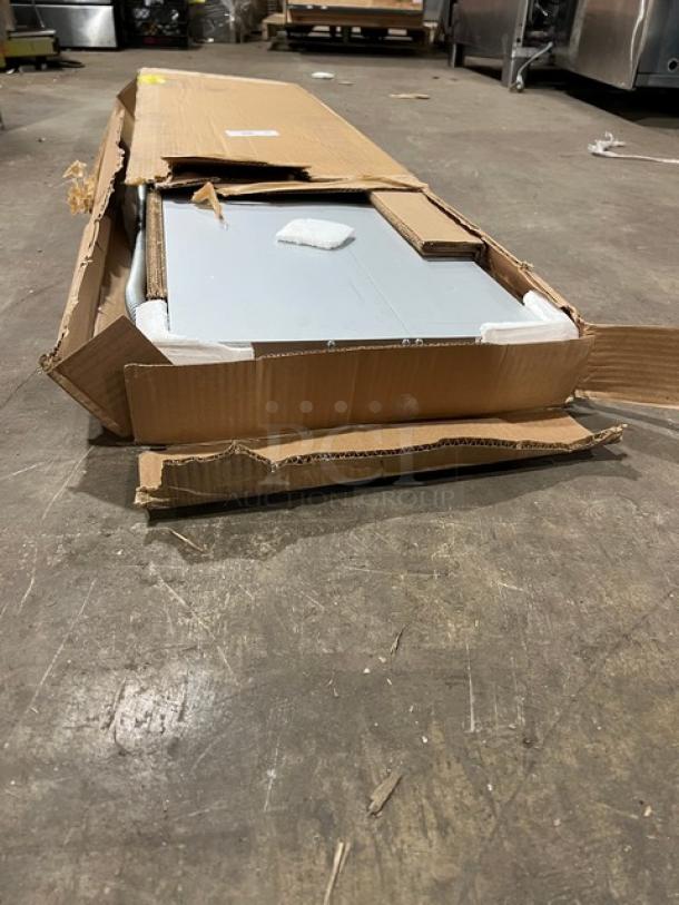 Brand new Hatco GRA60D 60" dual infrared warmer in open cardboard box, serial no. 8618762130, 120V single phase.