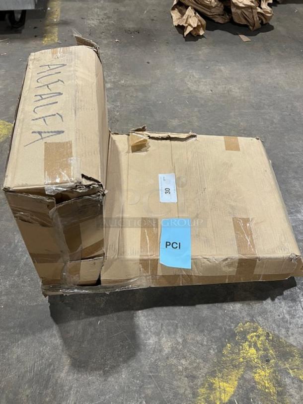 Cardboard box containing BK Resources stainless steel wall-mount hand sink, model BKHSW141014DTD, with label "PCI".