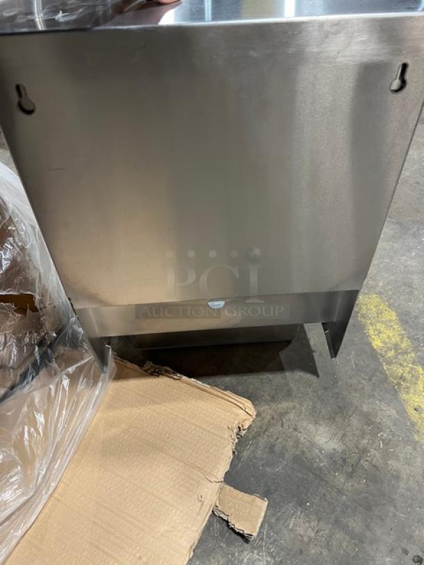 Brand new BK Resources stainless steel wall-mount hand sink, model BKHSW141014DTD, with towel and soap dispenser, single faucet hole.